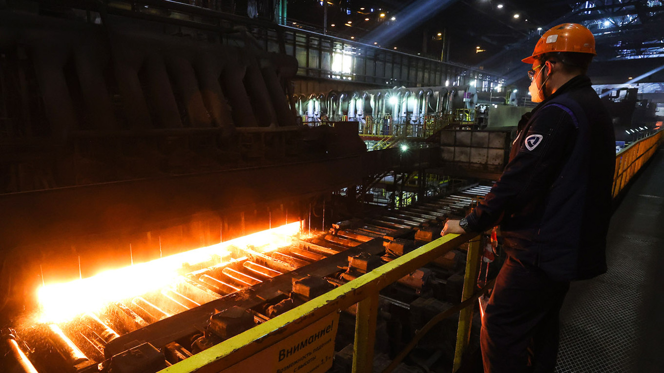  A man works at Cherepovets Steel Mill in Cherepovets. Sergei Karpukhin / TASS 