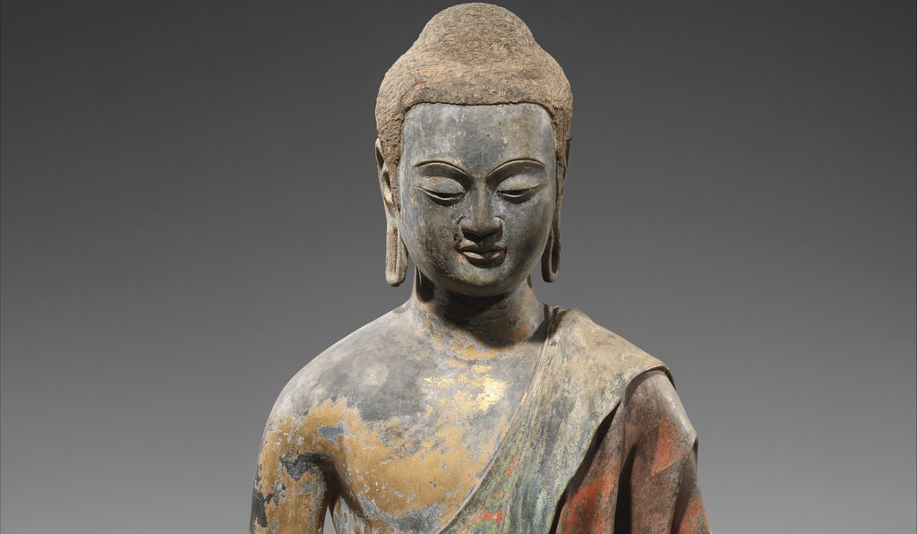 The Met Buddha (detail) is the best-preserved of the three, and is another early example of the hollow-core technique. Still visible on its exterior are traces of gold leaf and once-dazzling green and red paint.